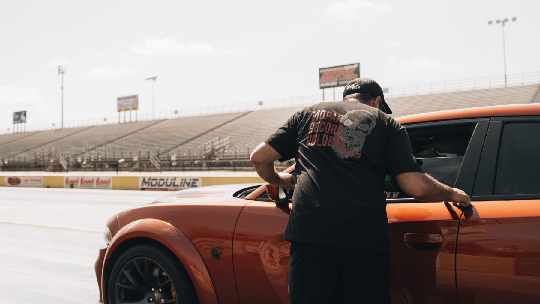 orange-car-testing-scaled-1